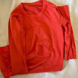 Orange lululemon swiftly tech long sleeve